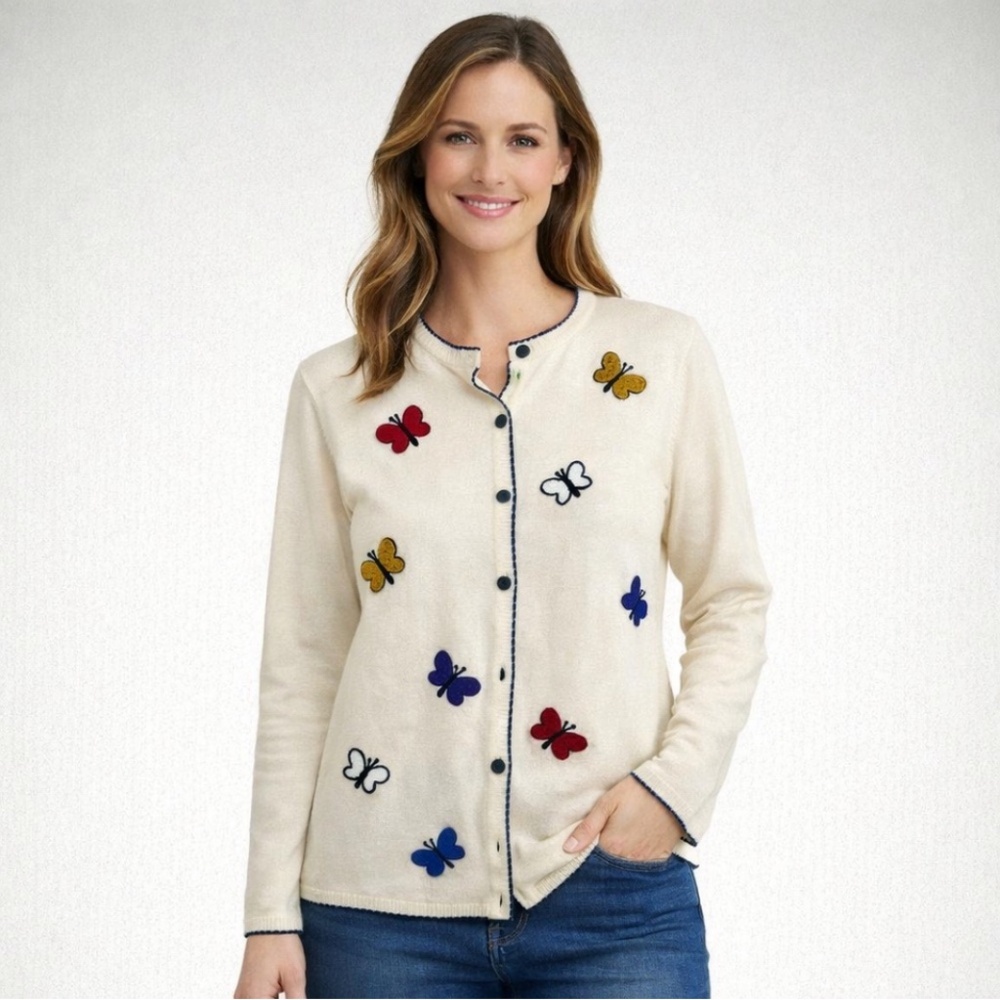 La madonna cream sweater with beautiful butterfly accents